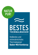 Grafisches Siegel „Bestes Thermalwasser“ mit dem Zusatz „Heißestes und mineralreichstes Thermalwasser Baden-Württembergs“. Oben grüner Kreis mit der Aufschrift „Natur pur!